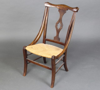 An American bentwood bar back chair with woven rush seat 