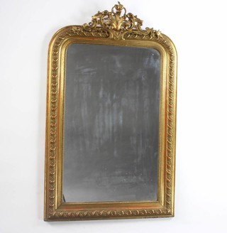 A 19th Century French D shaped mirror contained in a decorative gilt frame with pierced plaster crest 132cm x 80cm 