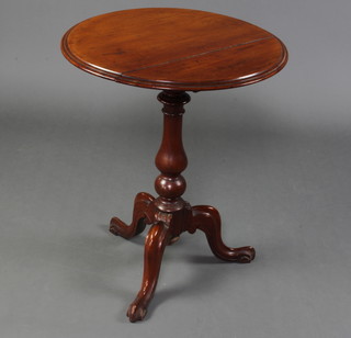 A Victorian circular mahogany snap top wine table raised on pillar and tripod base 67cm x 55cm diam. 