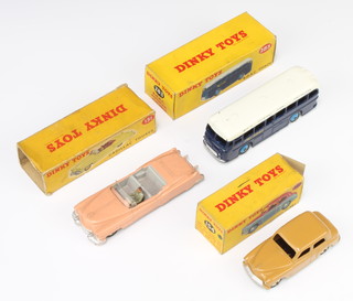 A Dinky Toys model 283 BOAC coach boxed (slight marks to box), a 131 Cadillac Tourer boxed (some damage to box) and a 154 Hillman Minx boxed (box damaged))