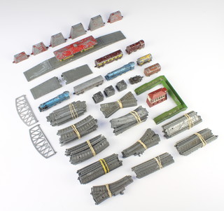A Lonestar train set comprising 2 locomotives, a diesel locomotive, 2 carriages, station, bridge and rails, all play worn 