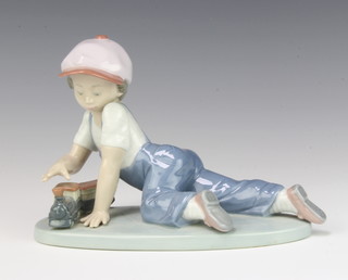 A Lladro Collectors Society figure of a boy playing with a toy train no.7619 19cm, boxed