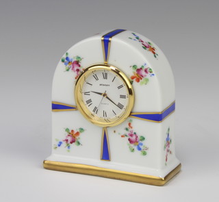 A modern Limoges timepiece decorated with spring flowers, having a quartz movement 8cm 