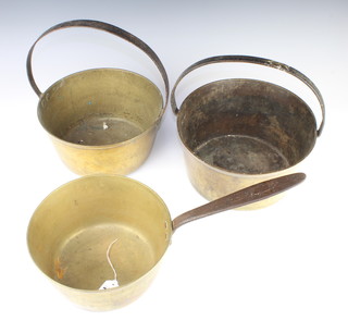 2 19th Century circular brass preserving pans with iron handles 15cm x 31cm and 14cm x 28cm together with a brass saucepan with polished steel handle 
