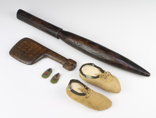 An Eastern carved hardwood club 21cm x 9cm, 1 other club 51cm x 3cm and 2 pairs of small moccasins 