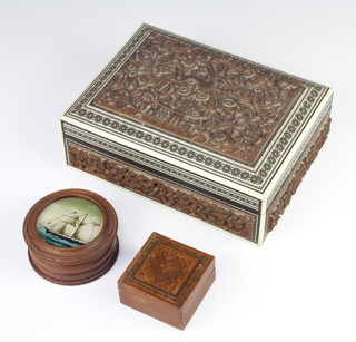 A square Tunbridge Ware box 3cm x 6 cm x 6cm, a Persian carved trinket box with hinged lid 7cm x 21cm x 6cm together with a cylindrical jar and cover the lid decorated a sailing ship 4cm x 9cm 