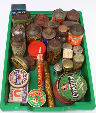 A tin of O'Cedar polish, a tin of NN lacquered grate polish, tin of Non Clog lubricating oil and other tins
