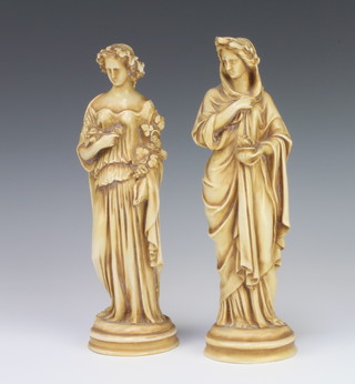 A pair of German porcelain figures of robed ladies 25cm 