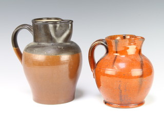 A stoneware jug stamped GPO 1956 22cm and a globular slip glazed ditto 
