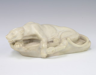 Clovis Masson (1838 - 1913) a carved marble figure of a crouching lioness, signed, 22cm