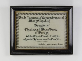 A Victorian sampler in memoriam - In affectionate remembrance of Mary Elizabeth, daughter of Charles and Mary Davis of Brough who died November 6th 1874, age 11 years and 8 months, safe in the arms of Jesus enclosed in a Greek key pattern border 22cm x 31cm 