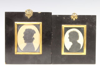 Silhouette miniatures oval portraits of ladies 8cm x 6cm  and 7cm x 6cm contained in ebonised frames and gilt metal mounted frames  
