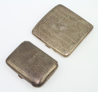 A silver engine turned cigarette case engraved with the Badge of the Royal Rifle Corps, Birmingham 1917 and 1 other, gross weight 200 grams 