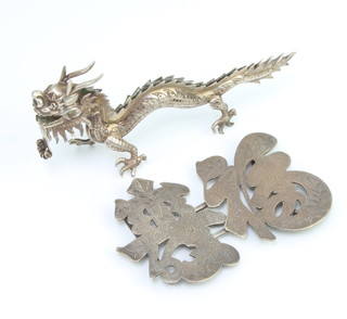 A Chinese silver buckle and a ditto figure of a dragon 95 grams