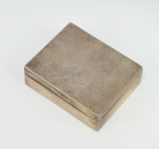 A rectangular silver cigarette box 3.5cm x 11cm x 9cm 