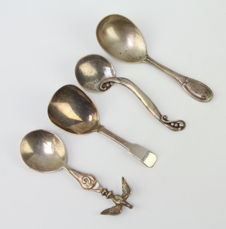 A Victorian silver caddy spoon London 1868 and 3 others, 78 grams