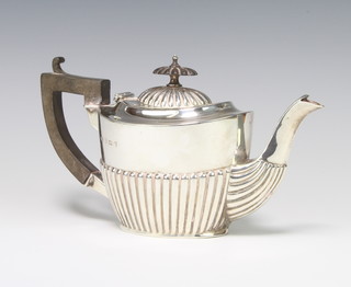 An Edwardian silver demi fluted batchelor's teapot Birmingham 1902, 243 grams gross 