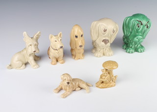 A Sylvac green figure of a dog no.1247 12cm, a beige ditto 12cm, another with stuck ear 1411 12cm, a reclining dog 12cm, an elf underneath a toadstool 1420 7cm, a hound 2950 13cm and a terrier 7785 12cm 