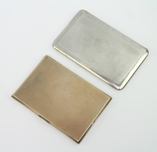 A silver engine turned gold plated cigarette case Birmingham 1935, silver ditto gross 397 grams