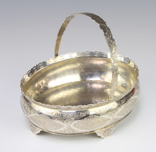 A Russian silver swing handled basket with chased decoration and pierced rim, 514 grams, 19cm