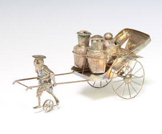A Chinese Sterling silver condiment in the form of a man pulling a rickshaw 20cm 