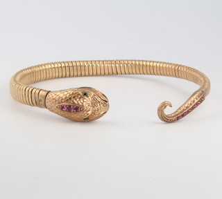A 9ct yellow gold emerald and ruby set snake bracelet with metal core, gross 20 grams