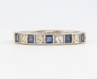 An 18ct white gold sapphire and diamond half eternity ring size P 1/2