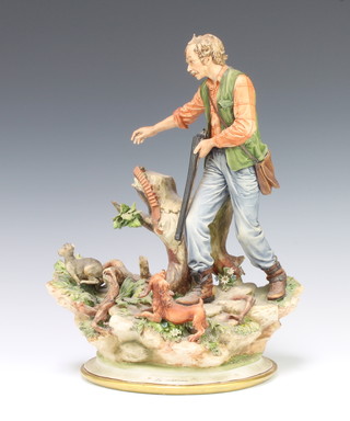 A Capodimonte group of a huntsman with spaniel chasing a hare 35cm 