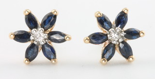 A pair of 9ct yellow gold sapphire and diamond floral ear studs 