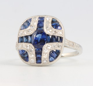 A platinum Art Deco style sapphire and diamond cluster ring size M 1/2