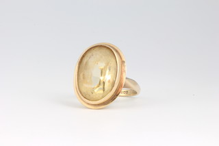 A 9ct yellow gold citrine ring size N 