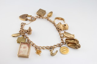 A 9ct yellow gold charm bracelet 46 grams gross