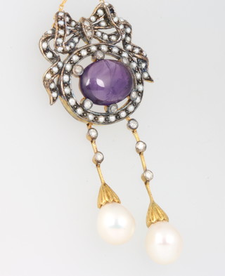A silver gilt cabochon amethyst, seed pearl, diamond and cultured pearl pendant on a gold chain 