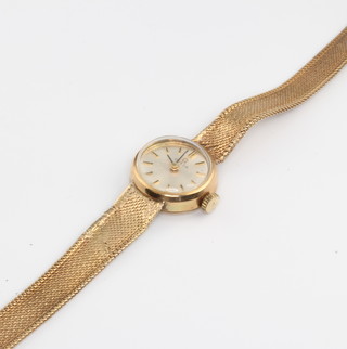 A lady's 9ct yellow gold Omega wristwatch on a mesh bracelet 10 grams gross