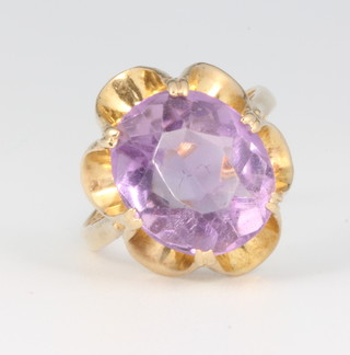 A 9ct yellow gold oval cut amethyst ring size H 1/2