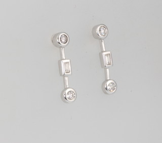 A pair of 18ct white gold baguette and brilliant cut diamond drop ear studs 15mm 