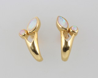 A pair of 18ct yellow gold opal ear studs 15mm 