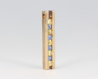 A 9ct yellow gold yellow and blue sapphire pendant 23mm 