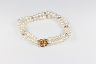A two row freshwater pearl bracelet with 14ct clasp 18cm 