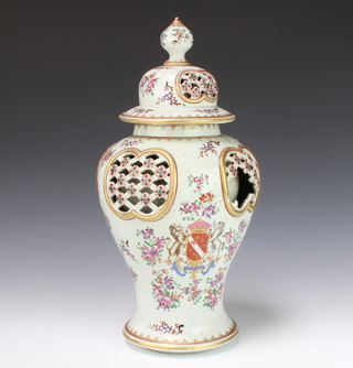 A 19th Century Samson baluster vase and cover with reticulated lid and body decorated with an armorial and flowers 44cm