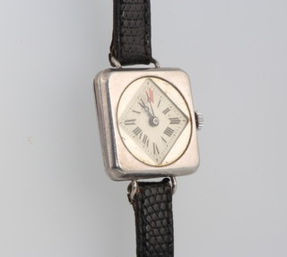 A lady's 1930's square cased silver pocket watch with red 12, the dial set as a diamond shape, on a leather strap 