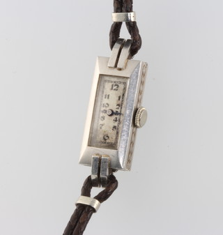 A lady's Art Deco rectangular cased platinum wristwatch 