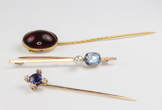 A gem set tie pin, 1 other and a bar brooch 