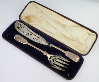 A cased pair of silver fish servers decorated on both sides with fish London 1851, 284 grams