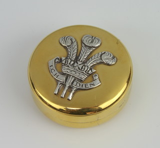 A silver gilt pill box decorated with Prince of Wales feathers London 1981, 47mm, 46 grams
