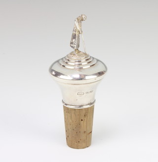 A silver mounted stopper the terminal in the form of a lady golfer 9cm 