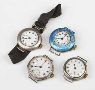 A lady's silver wristwatch and 3 others 