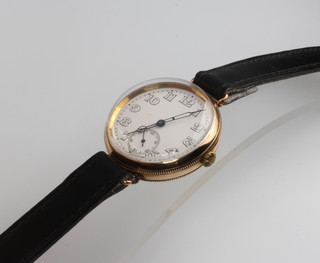 A gentleman's 9ct vintage Longines mechanical wristwatch with seconds at 6 o'clock contained in 33mm  screw bubble back case on a later strap 