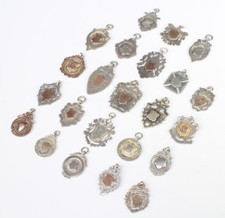 Twenty three silver fobs, 185 grams