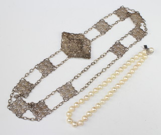 A Continental filigree belt together with a cultured pearl necklace